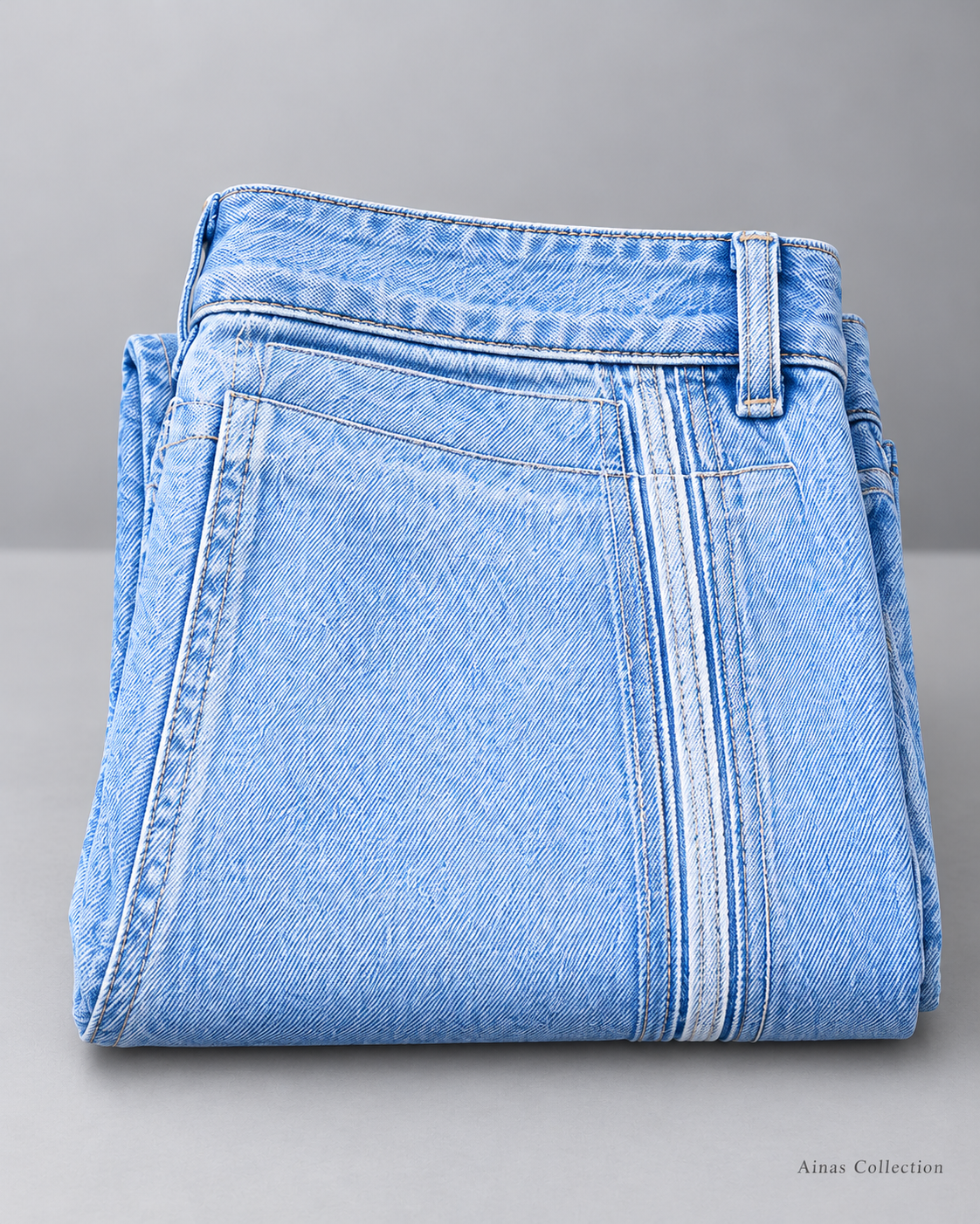 Ainas Collection light blue denim jeans — enhanced folded product view