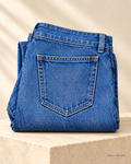 Ainas Collection washed blue denim jeans — enhanced folded product view