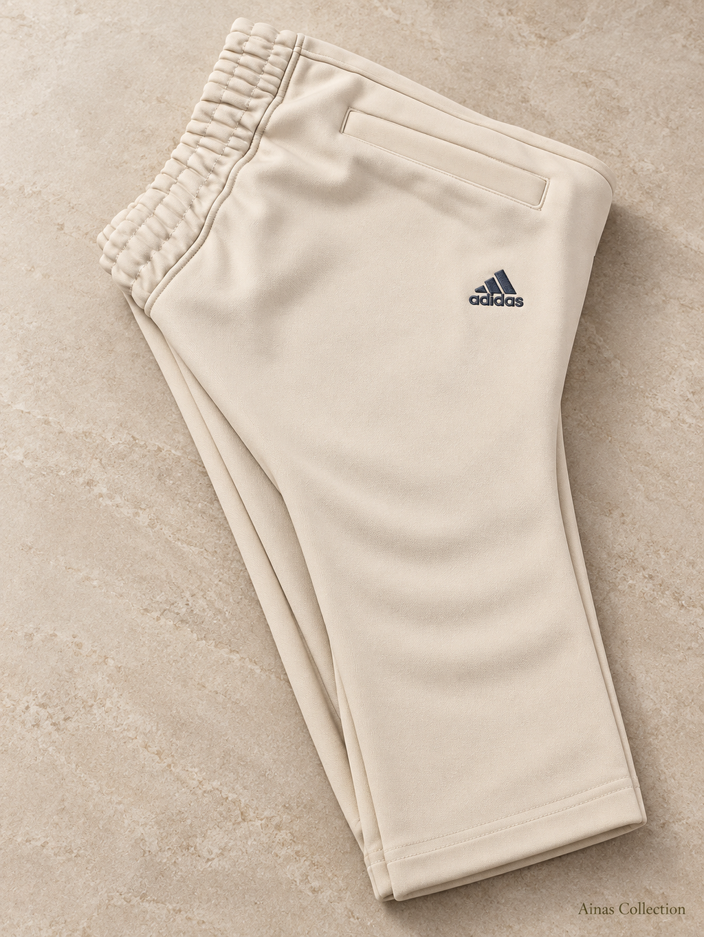 Ainas Collection cream shoulder stripe 2-piece tracksuit — trouser detail; enhanced actual product photograph