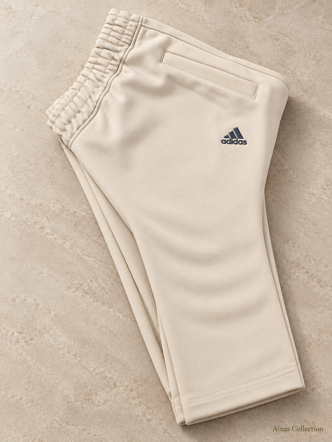 Ainas Collection cream shoulder stripe 2-piece tracksuit — trouser detail; enhanced actual product photograph