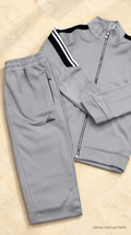 Ainas Collection grey shoulder stripe set — AI-assisted background edit of actual supplier video frame; confirm colour, size and availability
