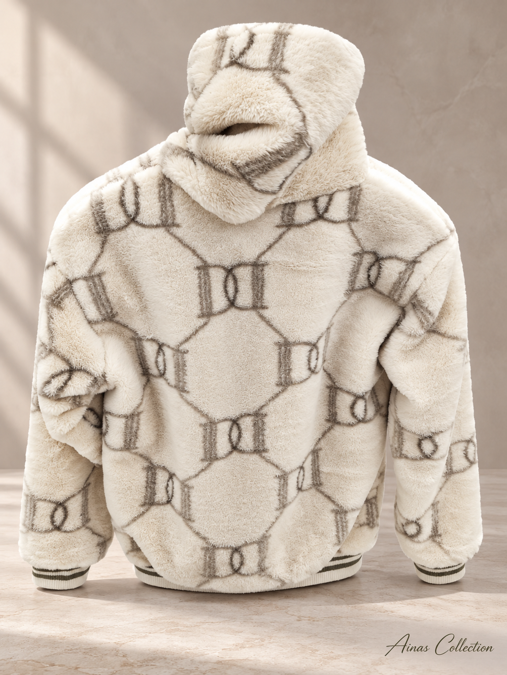 Ainas Collection cream back patterned plush hoodie; enhanced actual photograph