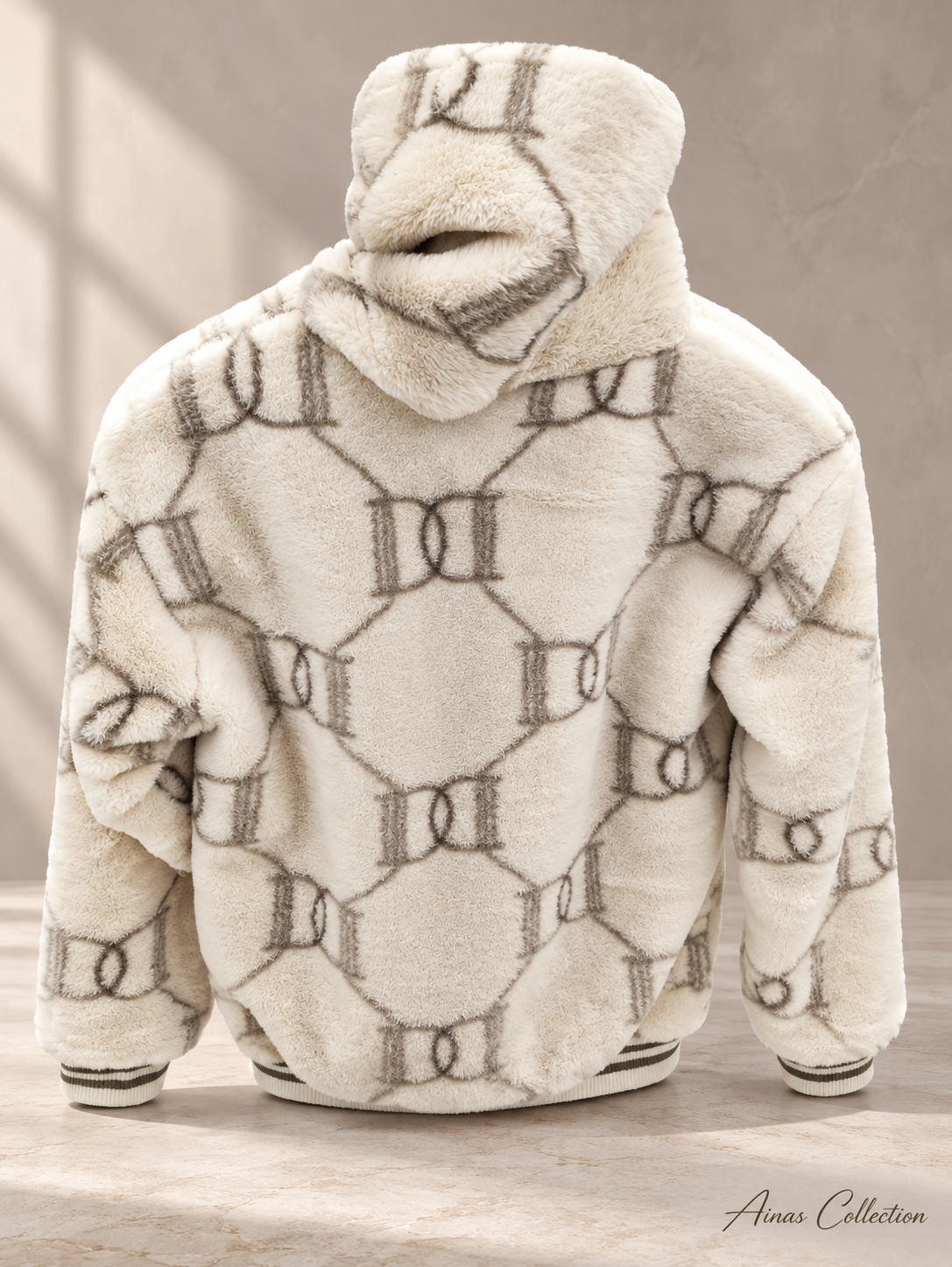 Ainas Collection cream back patterned plush hoodie; enhanced actual photograph